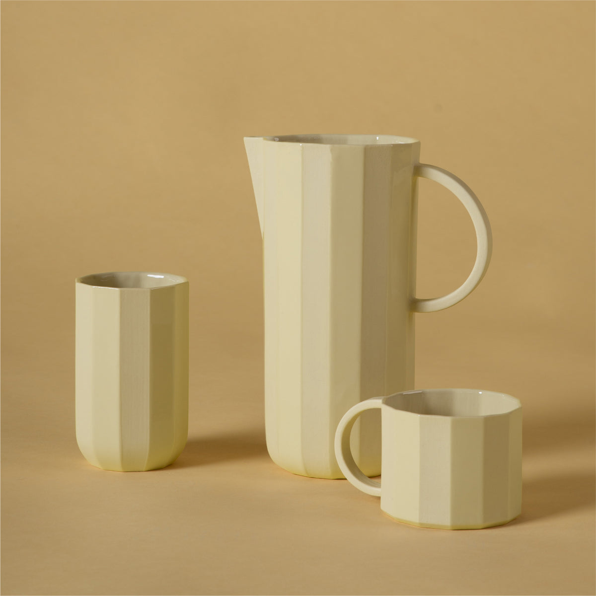 FACET Becher | Porzellan Lemon Gelb